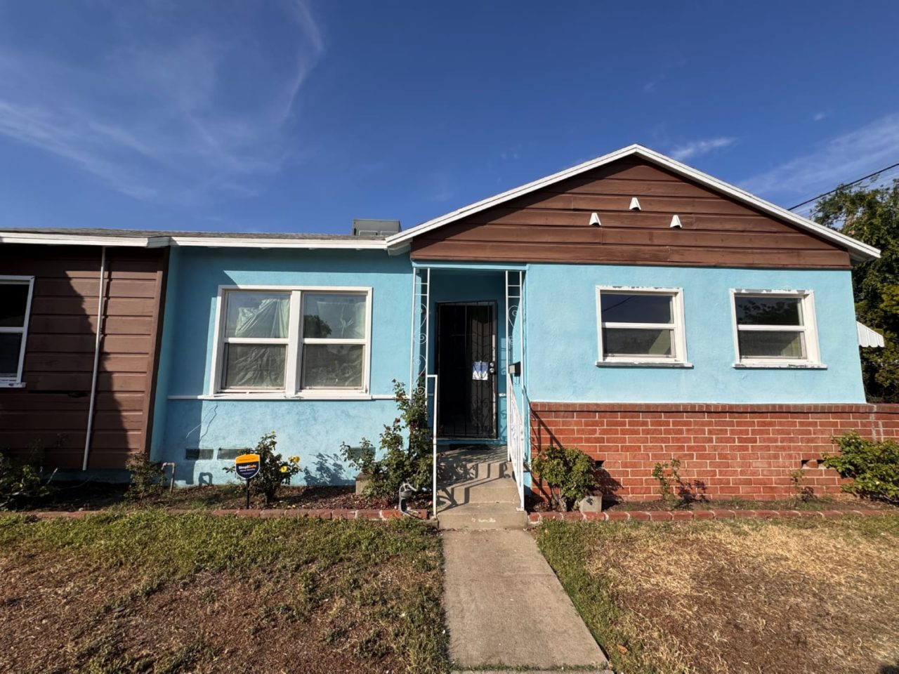 Stucco painting preparation work and surface repair before exterior painting