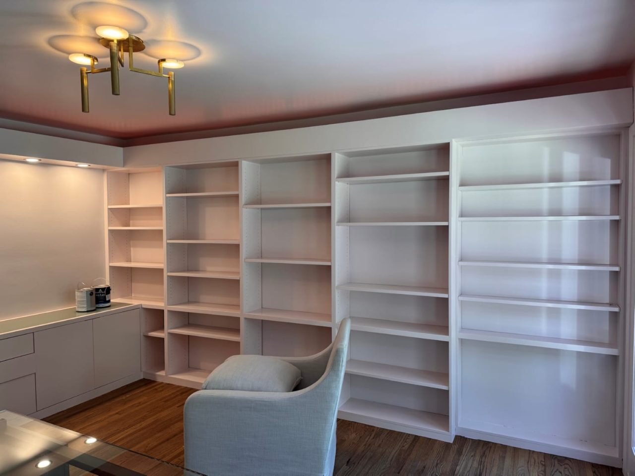 Interior painting cost professional painter working on walls